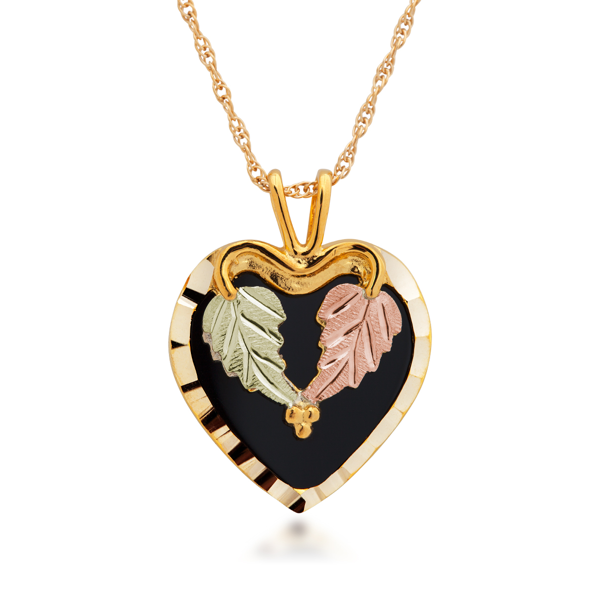 10K yellow gold Black Hills Gold onyx heart pendant with heart shaped leaf accent