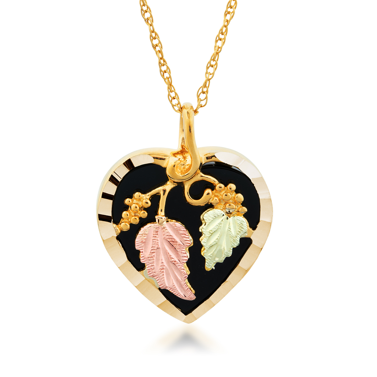 10K yellow gold Black Hills Gold black onyx heart pendant with grapevine and leaf accent