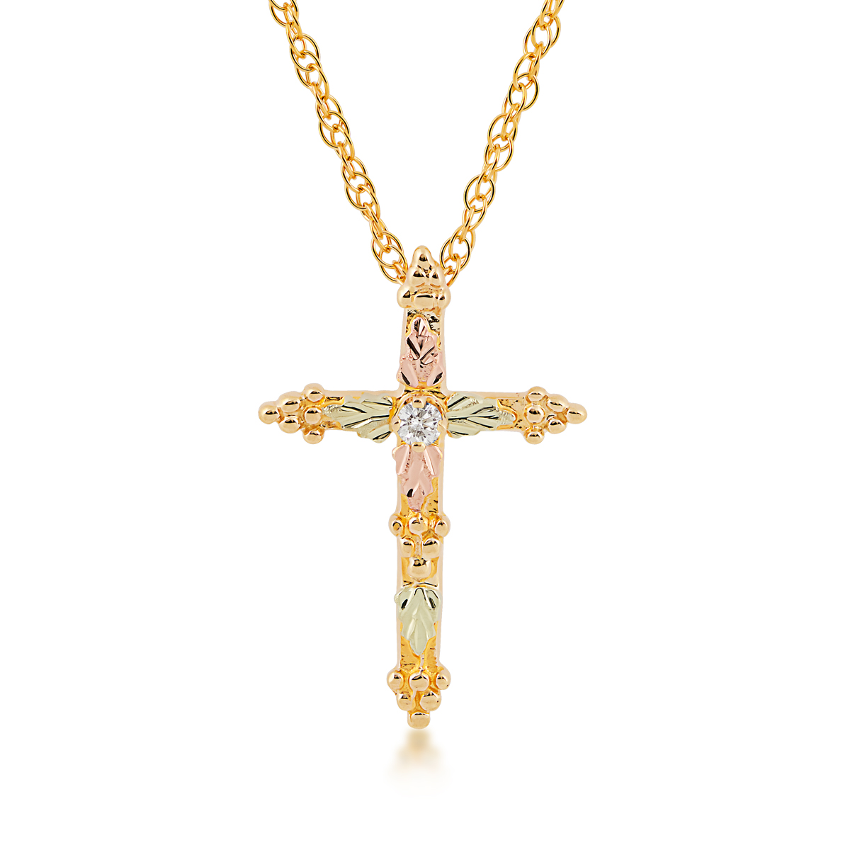 10K yellow gold Black Hills Gold diamond accent cross pendant with grape cluster ends