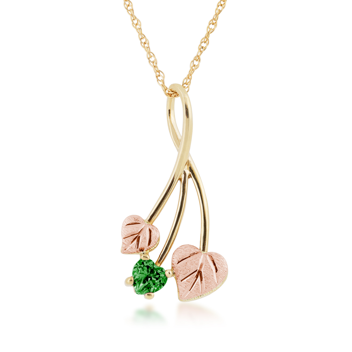 Black Hills Gold and heart-shaped green helenite pendant