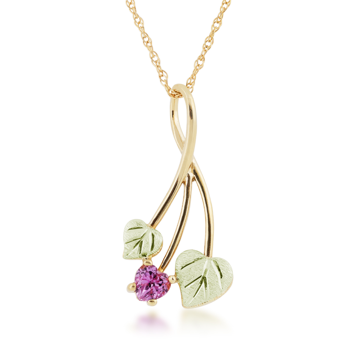 10K yellow gold Black Hills Gold created heart pink sapphire pendant